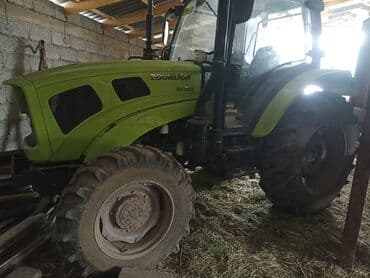 продаю связи с переездом: Трактор ZOOMLION RH1304 - Полноразмерный колесный трактор с кабиной — 2