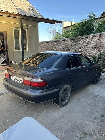step rf3: Mazda 626: 1999 г., 1.8 л, Механика, Бензин, Седан — 4