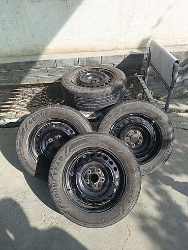 205 75 15: Колесо в сборе: стальная штампованная дисковая литая и шина Goodyear — 7