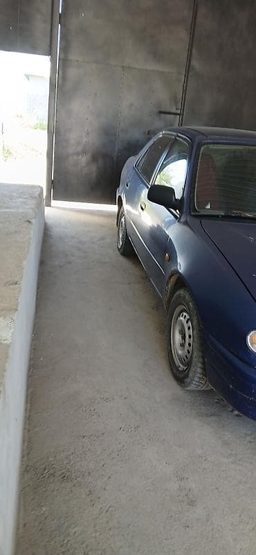 Транспорт: Toyota Corolla: 1995 г., Кол менен иштөөчү, Седан — 8