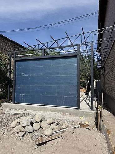 стоял в гараже: Секционные и рулонные гаражные ворота с калиткой Описание: - Ворота — 2