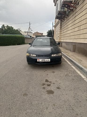 Mazda 626: 1995 г., 1.8 л, Механика, Бензин — 1