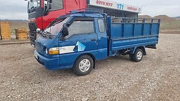 mini ev: Hyundai Porter: 2002 г., 2.6 л, Механика, Дизель, Универсал — 1