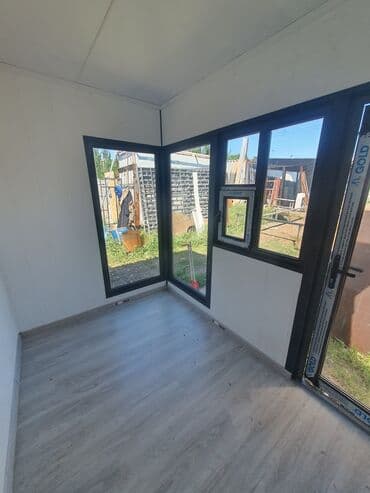 селекция дом куплю: Небольшой павильон прямоугольной формы с отделкой под дерево и серыми — 6