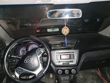 Kia Rio: 2016 г., 1.4 л, Автомат, Газ, Седан