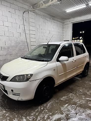 fort focus: Mazda Demio: 2003 г., 1.3 л, Автомат, Газ, Хэтчбэк — 4