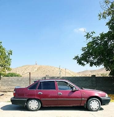 Унаа: Daewoo Nexia: 2001 г., 1.6 л, Кол менен иштөөчү, Бензин, Седан — 5