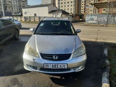 шипованные шины: Honda Civic: 2004 г., 1.6 л, Автомат, Бензин, Седан — 1