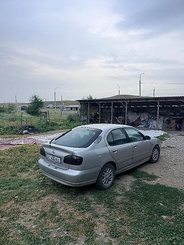 номер абхазия: Nissan Primera: 2001 г., 1.8 л, Механика, Бензин, Хэтчбэк — 3