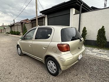 byd e7: Toyota Yaris: 2002 г., Автомат, Бензин, Хэтчбэк — 2