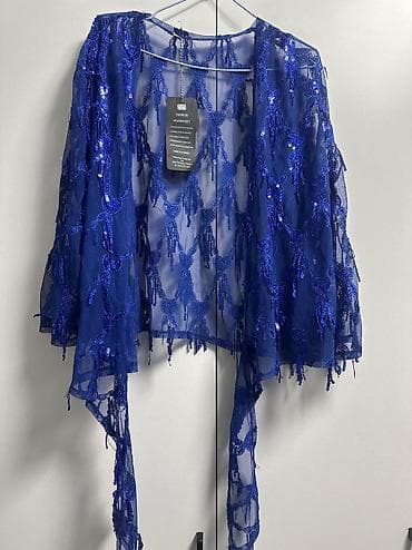 Яркая и красивая накидка с пайетками Отлично подойдет верх майки
