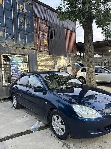 Mitsubishi Lancer: 2004 г., 1.6 л, Автомат, Бензин, Седан