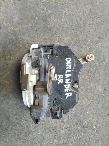 сигнализация с датчиком наклона: Mitsubishi Outlander\Airtrek дверной замок центральный, Митсубиси — 1