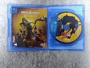 game controller: Mortal Kombat 11 Ultimate — издание для PS4 (дисковая версия). Состав — 2