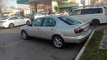 Транспорт: Nissan Primera: 2000 г., 1.8 л, Кол менен иштөөчү, Бензин, Лифтбек — 7