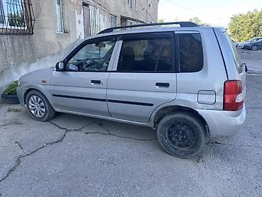 e50 amg: Mazda Demio: 2000 г., Механика, Минивэн — 2