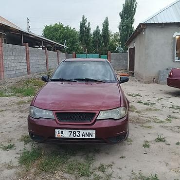 Daewoo Nexia, седан, бордовый цвет. Двигатель 1.6L бензин