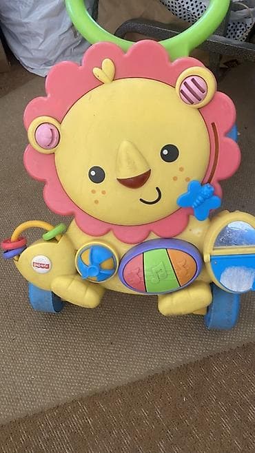 green lion: Игрушка-каталка/ходунки Fisher-Price «Львенок» для первых шагов - — 1