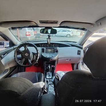 генезис 2022: Nissan Primera: 2003 г., Седан — 7