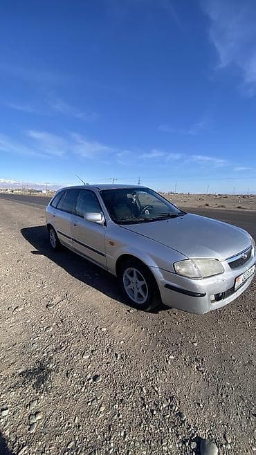 bnw x5: Mazda 323: 1998 г., 1.6 л, Механика, Бензин, Универсал — 3