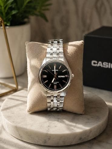 Классические наручные часы Casio на металлическом браслете. - Корпус