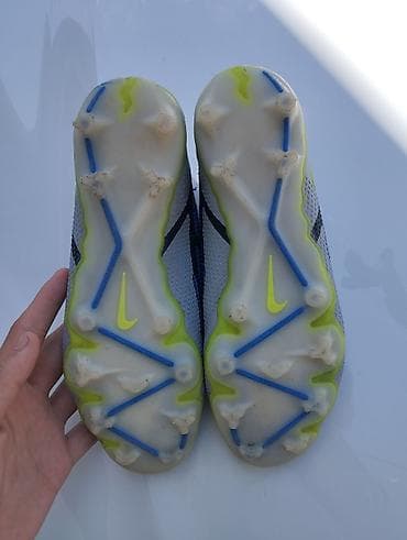бонго электро: Nike Phantom GX Elite DF FG — футбольные бутсы с высокими — 1