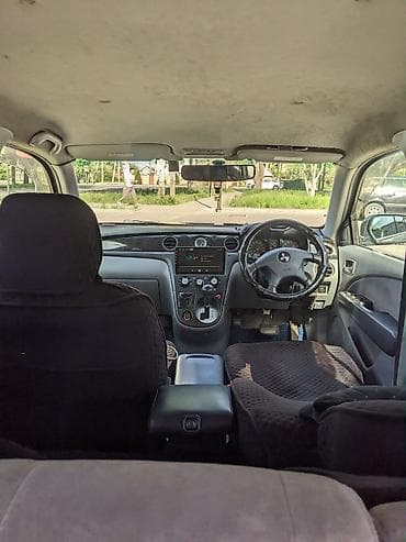 Продажа авто: Mitsubishi Airtrek: 2001 г., 2 л, Автомат, Газ, Кроссовер — 7