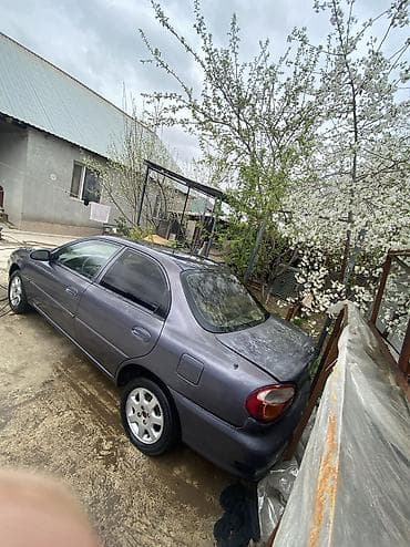 mini cuper: Kia Sephia: 1999 г., 1.8 л, Автомат, Бензин, Седан — 9