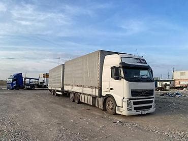 Транспорт: Тягач, Volvo, 2012 г., Тентованный — 2