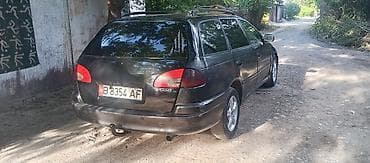 руль левый: Toyota Avensis: 2001 г., 2 л, Механика, Дизель, Универсал — 4