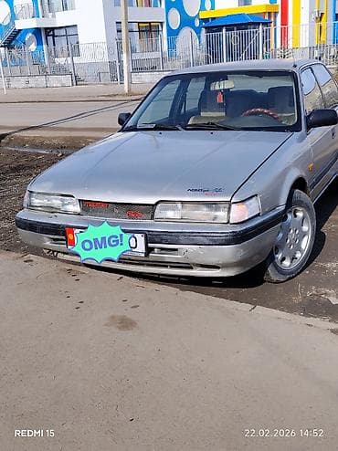 е 24: Mazda 626: 1988 г., 2 л, Механика, Бензин, Седан — 1