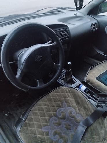 sg 9: Nissan Primera: 1996 г., Бензин, Универсал — 5