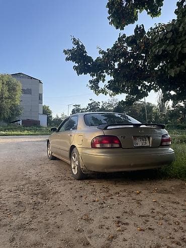 авто подборщик: Mazda 626: 1998 г., 2 л, Механика, Бензин, Седан — 5