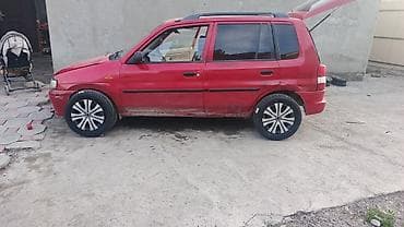 mazda 3: Mazda Demio: 1998 г., 1.3 л, Механика, Бензин, Хэтчбэк — 8