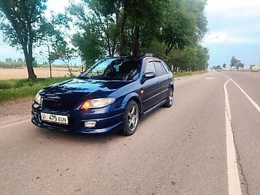 Mazda Familia: 2002 г., Хэтчбэк — 3