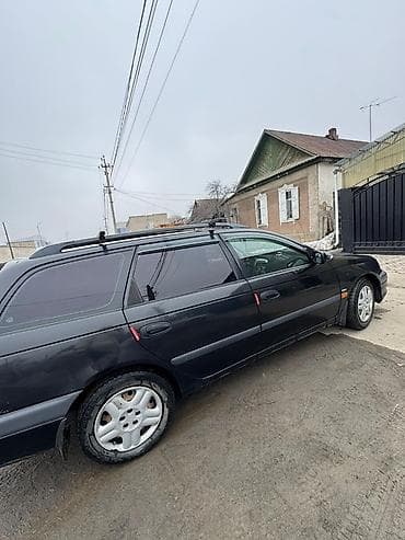 7 мест 3 ряда сидений: Toyota Avensis: 2001 г., 1.8 л, Механика, Бензин, Универсал — 2