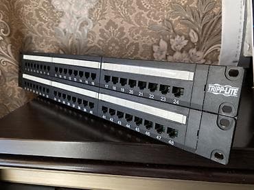 Патч-панель TRIPP LITE, 48 портов, Cat 5e, 2U, для монтажa в 19"