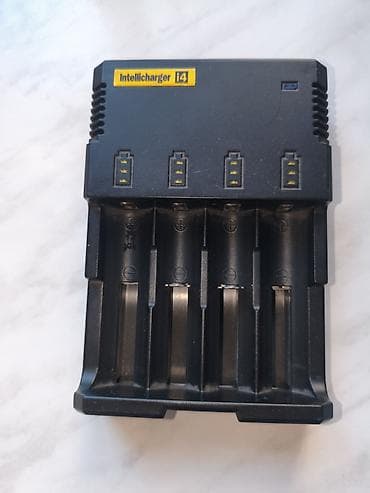 Два зарядное устройства: 1. Nitecore Intellicharger i4 Сломаны два