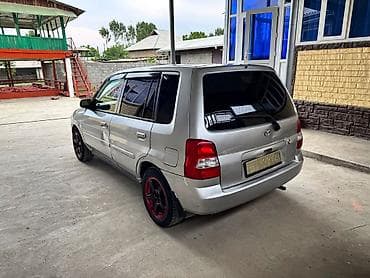 авто масла: Mazda Demio: 2001 г., 1.3 л, Автомат, Бензин, Хэтчбэк — 4