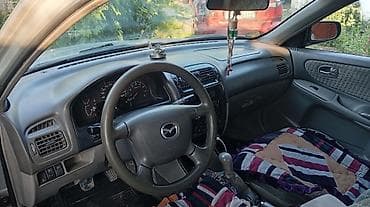 кондидер: Mazda 626: 2000 г., 1.8 л, Механика, Бензин, Седан — 6