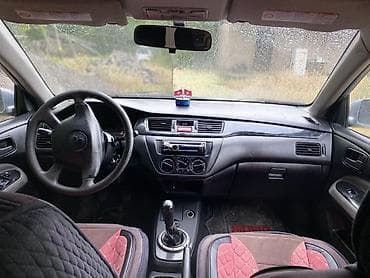 мтз 9: Mitsubishi Lancer: 2003 г., 1.6 л, Механика, Газ, Универсал — 6