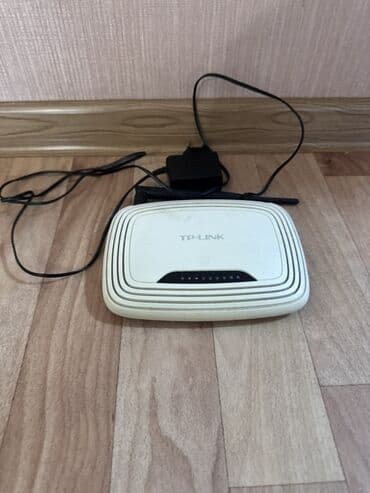 tp link роутер: Белый Wi-Fi роутер TP-Link с адаптером питания, предназначенный для — 1