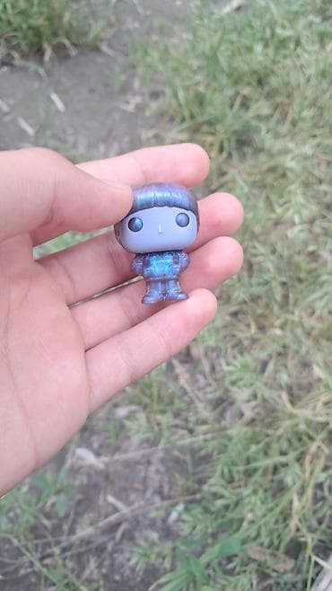 Мини-фигурка в стиле Funko (карманный размер). - Материал