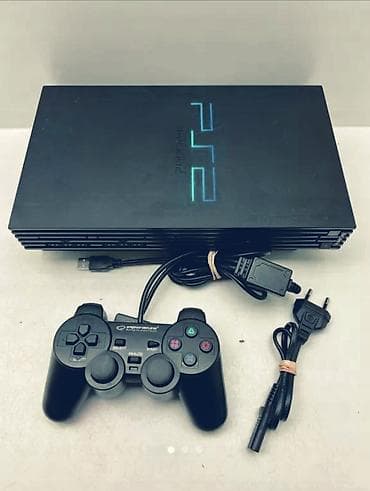 PlayStation 2 (Fat) — легендарная игровая консоль с поддержкой DVD и