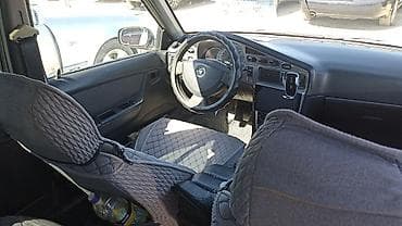 kia sephia: Chevrolet Nexia: 2009 г., 1.5 л, Механика, Седан — 3