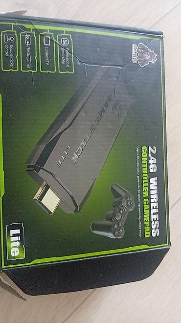Игровая приставка-стик Game Stick Lite 2.4G с беспроводными геймпадами at lalafo.kg Игровая приставка-стик Game Stick Lite 2.4G с беспроводными геймпадами
