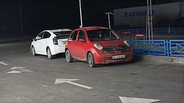 byd e2 2019: Nissan Micra: 2002 г. — 5