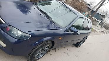 bl5 subaru: Mazda 323: 2003 г., Механика, Газ, Хэтчбэк — 6