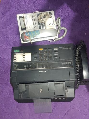 Отопительные приборы: Стационарный телефон Проводной, Дисплей, Автоответчик, Возможность настенной установки — 1