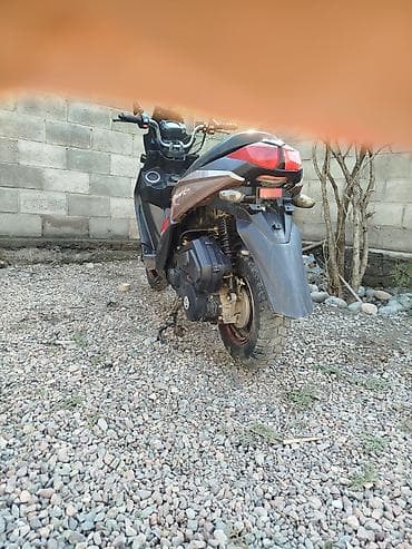 глушитил: Скутер/мопед городско‑эндурного типа. Основные особенности: - — 4